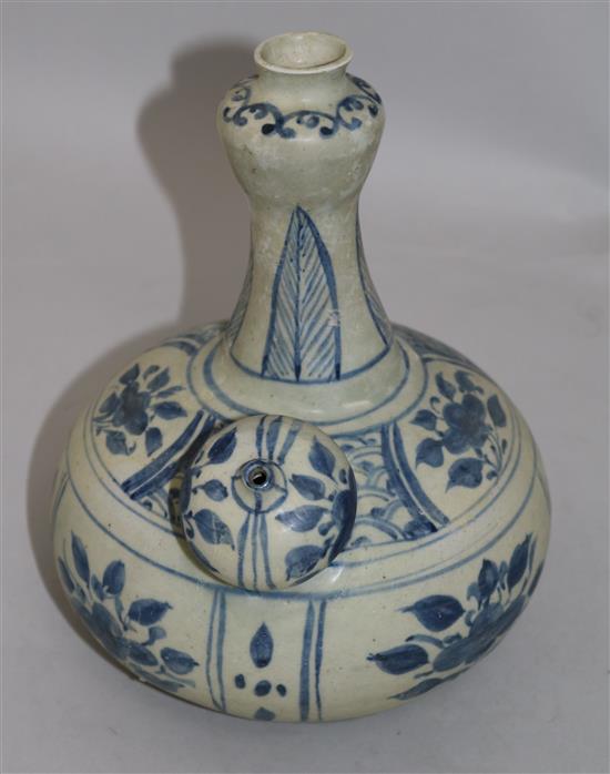 An Annamese blue and white porcelain kendi, 15th century, 23cm, sea-etched glaze